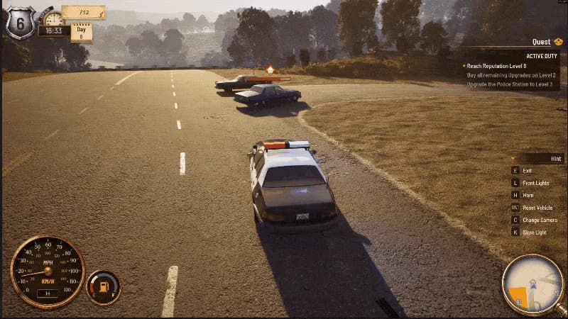 A patrol car pursuing another vehicle on a Winston Springs road